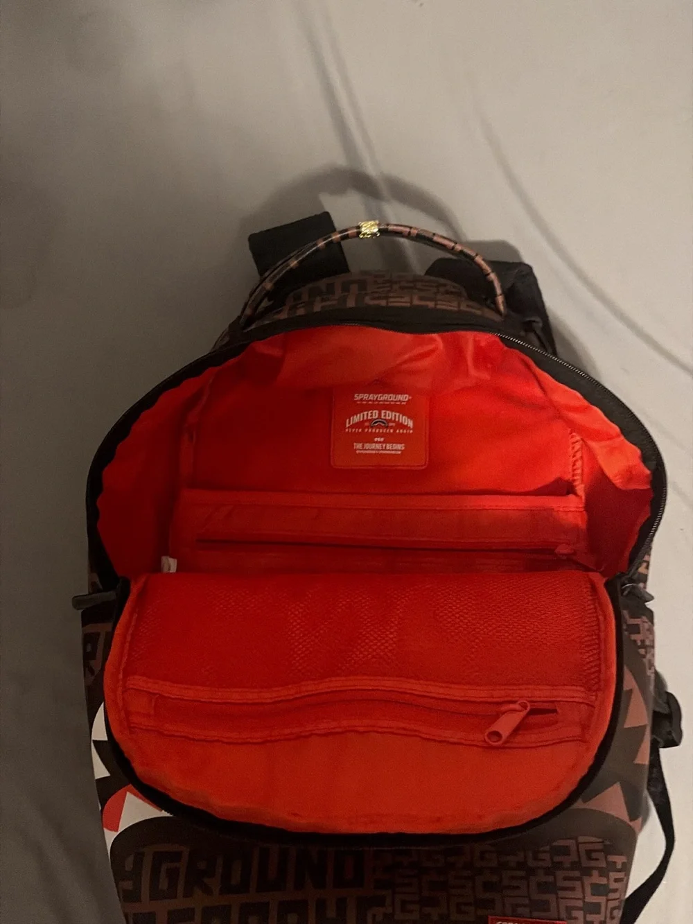 Sprayground Brown Shark-Mouth Logo Backpack with Red & White Accent